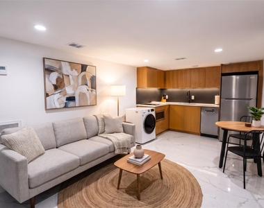 2416 E 10th St - Photo Thumbnail 2