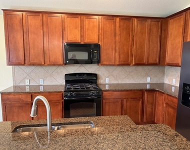 15008 Fernhill Dr - Photo Thumbnail 4