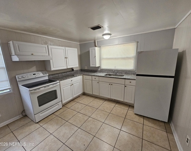 9042 7th Avenue - Photo Thumbnail 1