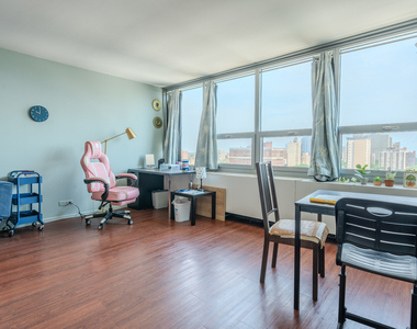 1700 E 56th Street - Photo Thumbnail 2