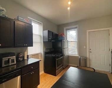 1706 W 17th Street - Photo Thumbnail 1