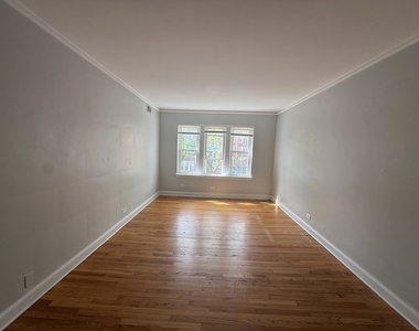 2000 W Jarvis Avenue - Photo Thumbnail 1