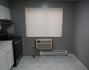 704 W 111th Street - Photo Thumbnail 8