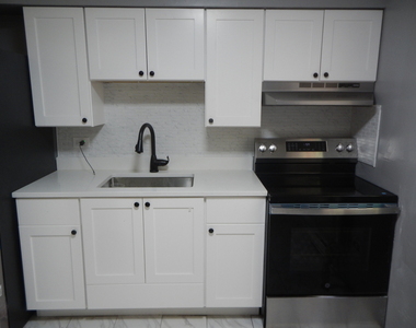 704 W 111th Street - Photo Thumbnail 7