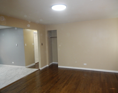 704 W 111th Street - Photo Thumbnail 3
