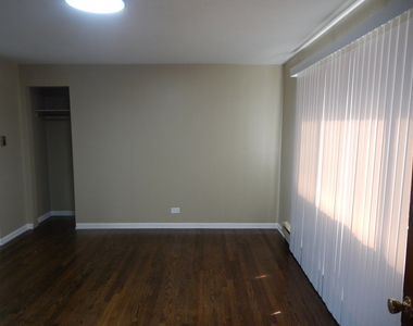 704 W 111th Street - Photo Thumbnail 2