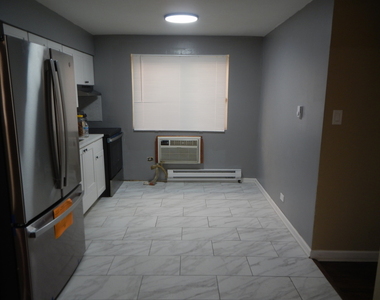 704 W 111th Street - Photo Thumbnail 5