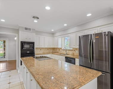 7715 Brush Wood Drive - Photo Thumbnail 3