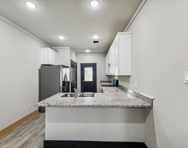7912 Bowen Street - Photo Thumbnail 1