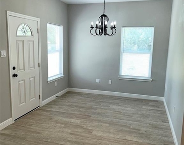 8006 Bowen Street - Photo Thumbnail 1
