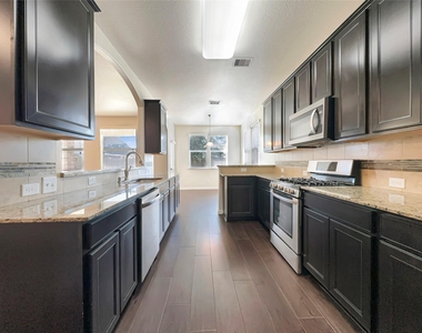 8311 Bay Oaks Drive - Photo Thumbnail 3