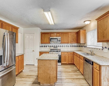 6935 Moss Boulder Drive - Photo Thumbnail 3