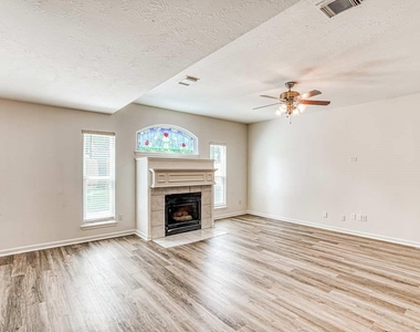 6935 Moss Boulder Drive - Photo Thumbnail 5