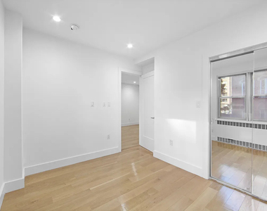 213 East 37th Street - Photo Thumbnail 5