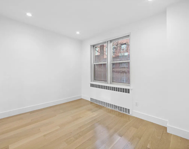 213 East 37th Street - Photo Thumbnail 4