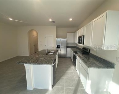 2906 Suncoast Plains Drive - Photo Thumbnail 2