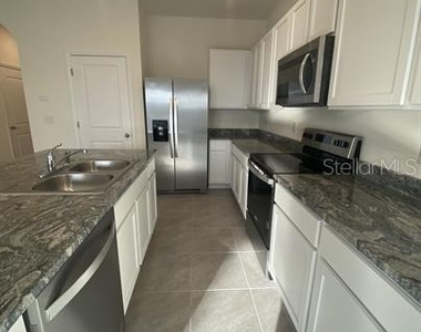 2906 Suncoast Plains Drive - Photo Thumbnail 3
