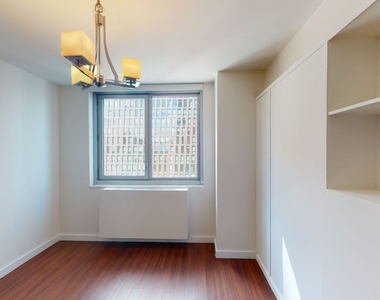 401 E 34th St - Photo Thumbnail 3