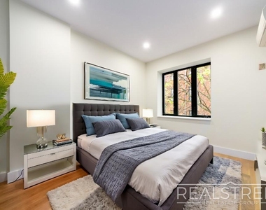 1406 Lincoln Pl - Photo Thumbnail 3