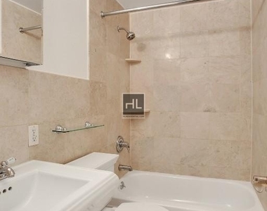 E 13th St. - Photo Thumbnail 2