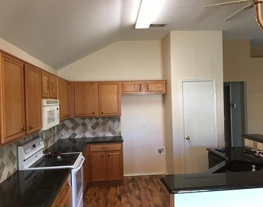 7309 Caruth Drive - Photo Thumbnail 6