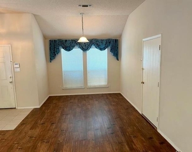 8055 Raleigh Drive - Photo Thumbnail 2