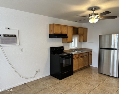 427 E Friar Avenue - Photo Thumbnail 2