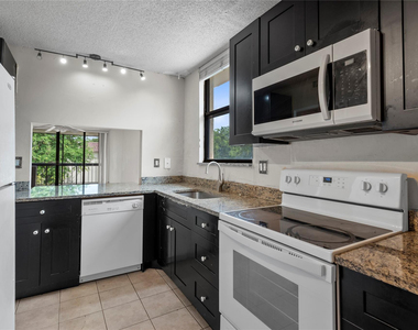 8429 Forest Hills Drive - Photo Thumbnail 2