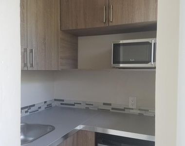 1223 Ne 18th Avenue - Photo Thumbnail 3