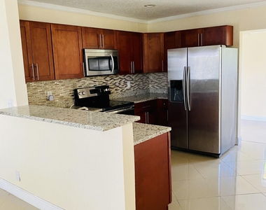 4559 Nw 16th Way - Photo Thumbnail 1