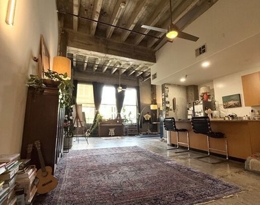 711 S Olive Street - Photo Thumbnail 1
