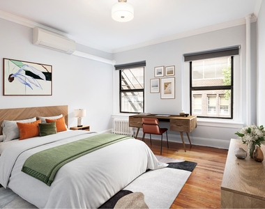 240 E 24th Street - Photo Thumbnail 3