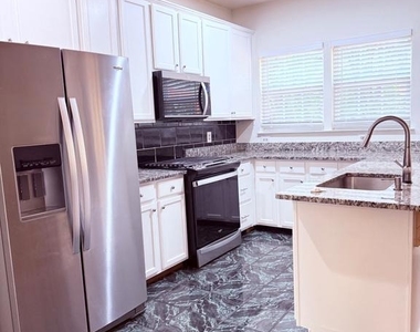 5944 Raina Drive - Photo Thumbnail 3