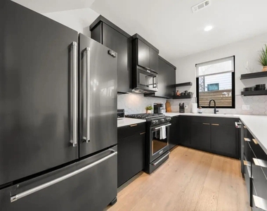 2311 E 8th St - Photo Thumbnail 2