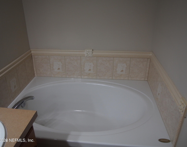 12301 Kernan Forest Boulevard - Photo Thumbnail 18