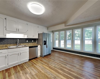 6839 Woodcreek Lane - Photo Thumbnail 4