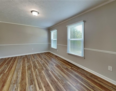 6839 Woodcreek Lane - Photo Thumbnail 3