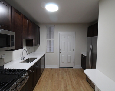 6307 N Mozart Street - Photo Thumbnail 2