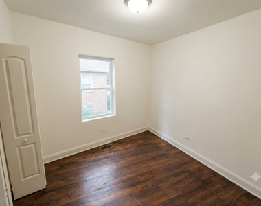 2065 W Jarvis Avenue - Photo Thumbnail 5
