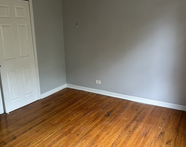9032 S Dauphin Avenue - Photo Thumbnail 3
