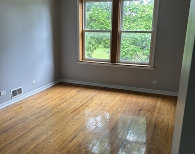 9032 S Dauphin Avenue - Photo Thumbnail 1