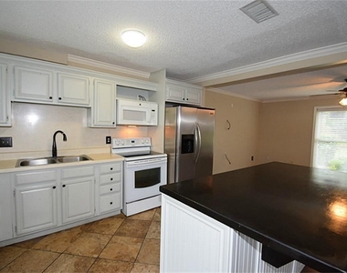 9323 Westwood Village Drive - Photo Thumbnail 5