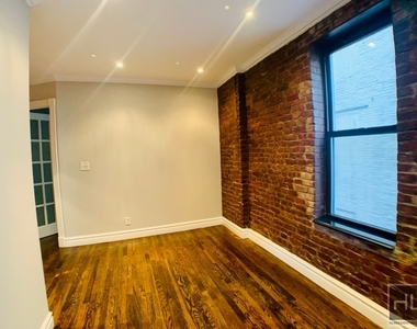E 13th St. - Photo Thumbnail 4