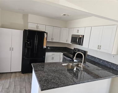 3905 Starflower Court - Photo Thumbnail 2