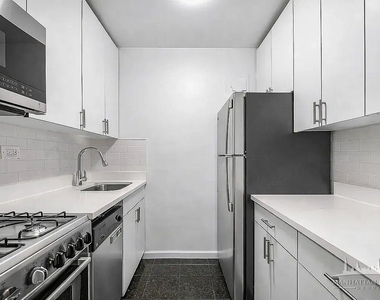 E 35th St - Photo Thumbnail 2