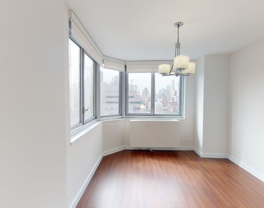 401 E 34th St - Photo Thumbnail 3