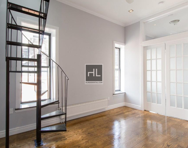 E 13th St. - Photo Thumbnail 4