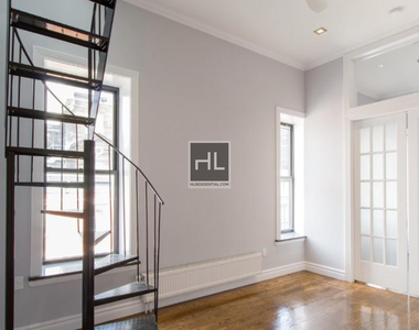 E 13th St. - Photo Thumbnail 1