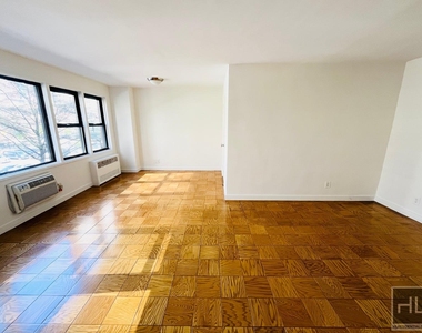 East 36 Street - Photo Thumbnail 2