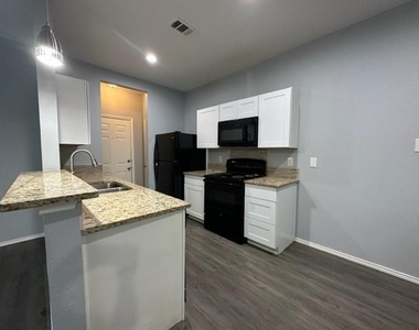 7411 Novella Drive - Photo Thumbnail 3